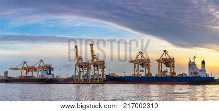 Shipping yard and teminal loading at sunrise scene. Transportation