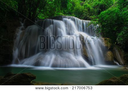Beautiful waterfall in the middle of rainforest.