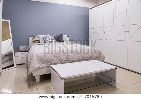 view of Cozy modern bedroom interior with furniture