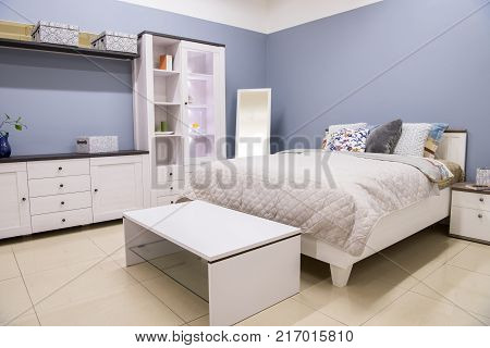 view of Cozy modern bedroom interior with furniture