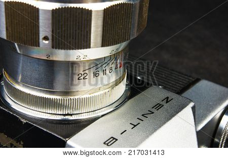 DONETSK, UKRAINE - May 07, 2016: old soviet film SLR camera Zenit - B with lens Jupiter-11, for use with 35 mm film, made in USSR in 1968 - 1973, manufactured by KMZ, with original leather case