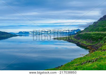 Coastline and landscape along the Skotufjordur fjord in the west fjords region Iceland