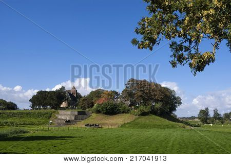 The terp of Hogebeintum in Friesland has a height of 8.80 meters and is therefore the highest artificial dwelling hill in the Netherlands