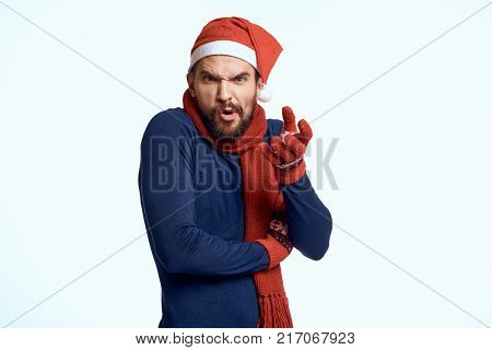 man on a white background, christmas clothes, emotions, new year, holiday, christmas.