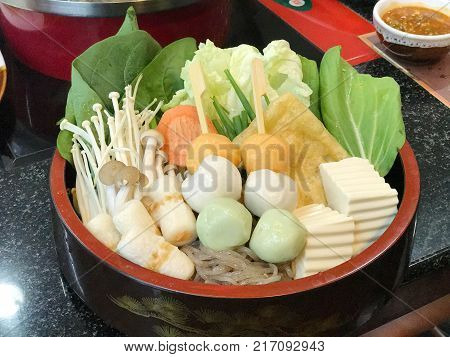 Sukiyaki or shabu set in Japanese bowl style vegetable fish ball tofu mushroom