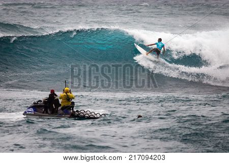 SUNSET BEACH HAWAII USA - DECEMBER 2: Surf patrol staff members filming surfers at the 2017 Vans World Cup of Surfing competition at Sunset Beach on Oahu's scenic North Shore. This is the second of three surfing competitions and Conner Coffin