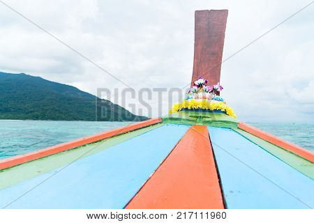 long tailed boat fishing boat motor boat on the blue sea