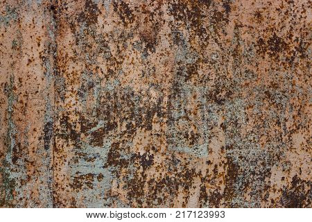 Abstract background of old worn wooden boards of different colors close up