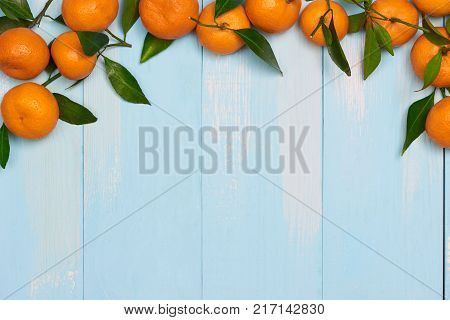 Top view accessories Chinese new year festival decorations.orangeleaf on blue background