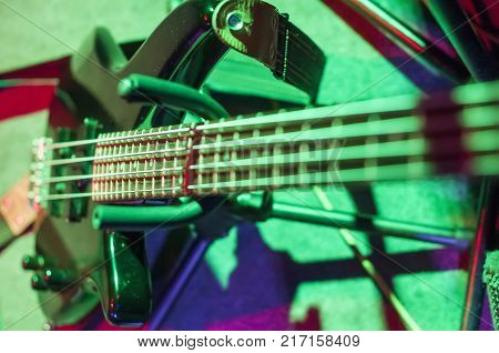 The guitar at the concert mounted in the rack