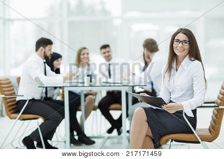 leading lawyer of the company on background, business meeting business partners. the photo has a empty space for your text.