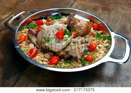 Roasted pork with farofa
