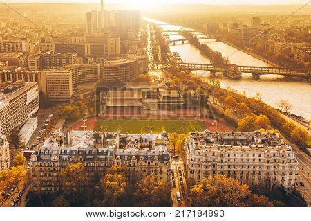 Aerial Panorama Of Paris City In Late Autumn From Maine-montparnasse Tower At Sunset.