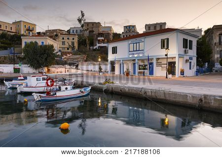 INOUSES, GREECE - NOVEMBER 10, 2017: Early morning view of the harbour on Inouses island in Greece on November 10, 2017.
