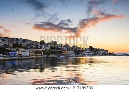 Early morning view of the harbour on Inouses island in Greece.