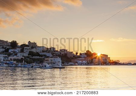 Early morning view of the harbour on Inouses island in Greece.