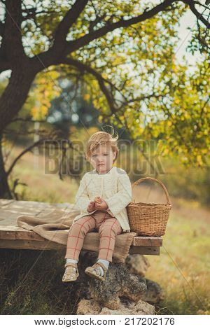 Adorable Pretty Baby Girl With Blond Red Hair Wearing Ivory Colour White Sweater Enjoy Life Time Cit