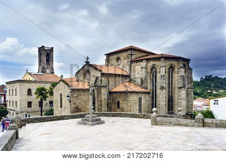 View of the church of San Francisco in Gothic style built in the second half of the XIV century and stone cross views from the Plaza de Andrade in Betanzos Galicia Spain