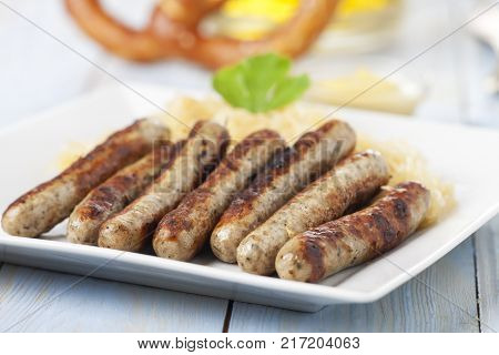 nuremberg bratwurst with cabbage on a plate