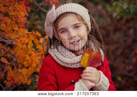 Cute Young Russian Girl Stylish Dressed In Warm Red Handmade Jacket Blue Jeans Boots And Hooked Head