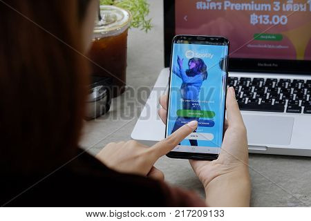 CHIANG MAITHAILAND - DEC 08 2017 :Samsung galaxy S8 Plus opening spotify appSpotify is a music service that offers legal streaming music.