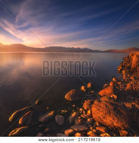 Beautiful lake reflections with nice blue sky and clouds