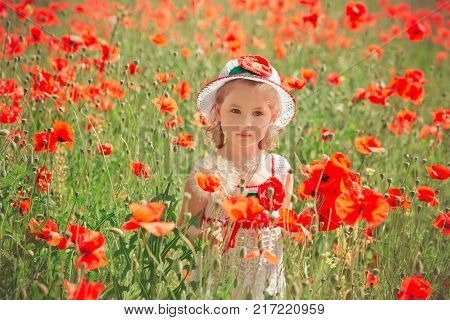 Cute Blond Young Girl Child Stylish Dressed In White Handmade Hooked Dress Wearing Airy Hat Top Posi