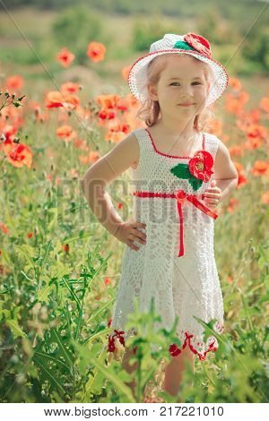 Cute Blond Young Girl Child Stylish Dressed In White Handmade Hooked Dress Wearing Airy Hat Top Posi
