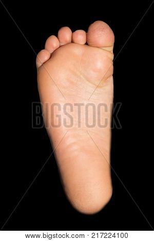 foot on a black background