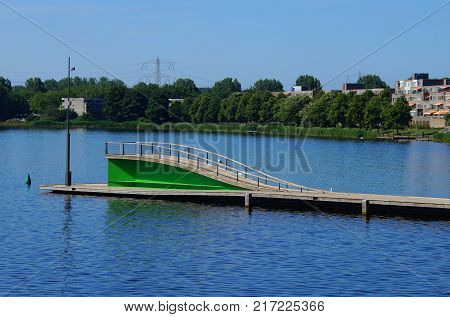 Almere, Flevoland, The Netherlands - June 18, 2017: Pier Weerwater in de center of Almere stad. Almere is the youngest and fastest crowing city in the Netherlands.