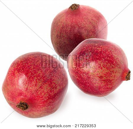 Three ripe red granet. Set fruits of red ripe pomegranate on the White Background. Vegetarian Concept.
