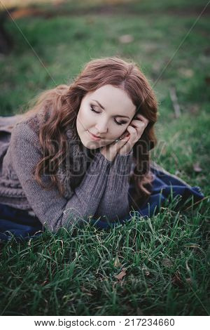 Sensual Brunette Lady With Pout Pink Lips And White Cheeks Wearing Casual Cosy Sweater With Fur Posi