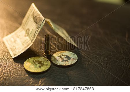 One dollar costs an angle or a roof over a pistol cartridge next to physical coins by bitcoins. Tone.