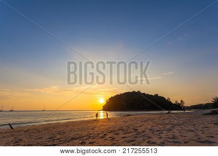 stunning sunset at Kala island. Layan beach and Bangtoa beach is the same beach the left side is Bangtoa beach the right side is Layan beach in the end of Layan beach has Kala island