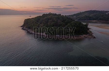 stunning sunset at Kala island. Layan beach and Bangtoa beach is the same beach the left side is Bangtoa beach the right side is Layan beach in the end of Layan beach has Kala island