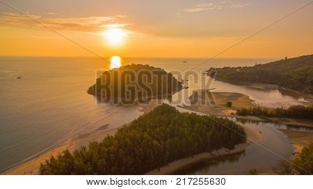 stunning sunset at Kala island. Layan beach and Bangtoa beach is the same beach the left side is Bangtoa beach the right side is Layan beach in the end of Layan beach has Kala island
