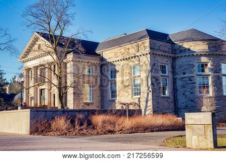GUELPH, ONTARIO, CANADA - MARCH 15, 2016: View of Guelph University campus buildings with a blend of modern and traditional architecture.