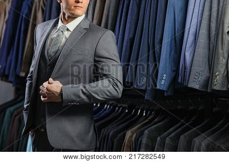 Perfect to the last detail. Modern businessman. Fashion shot of a handsome man in elegant classic suit. Men's beauty, fashion.