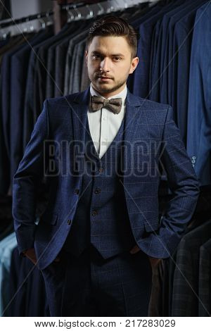 Perfect to the last detail. Modern businessman. Fashion shot of a handsome man in elegant classic suit. Men's beauty, fashion.