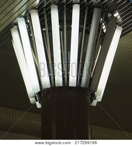 Rectangular lights on a granite column, in a circle,