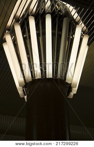 Rectangular lights on a granite column, in a circle,