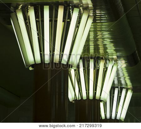 Rectangular lights on a granite column, in a circle,