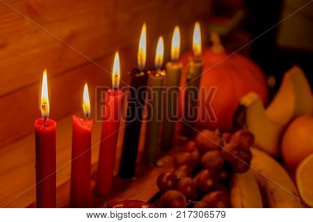 Kwanzaa Holiday Concept With Decorate Seven Candles Red, Black And Green, Gift Box, Pumpkin,corn And