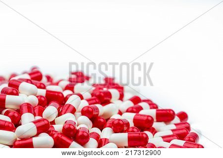 Selective focus of antibiotic capsules pills on white background with copy space. Drug resistance concept. Antibiotics drug use with reasonable and global healthcare concept.