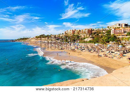 Summer holiday on El Duque beach in Tenerife, famous Adeje coast on Canary island, Spain