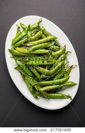 Spicy fried Green Peas pod or chatpata matar falli