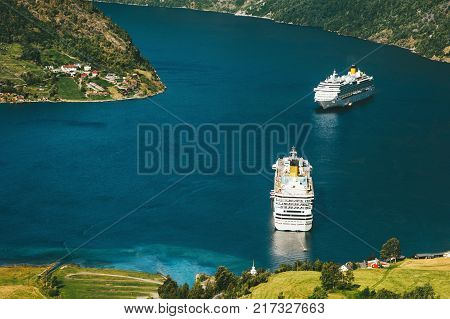 Geiranger fjord and ferry ships Landscape in Norway Travel scenic aerial view