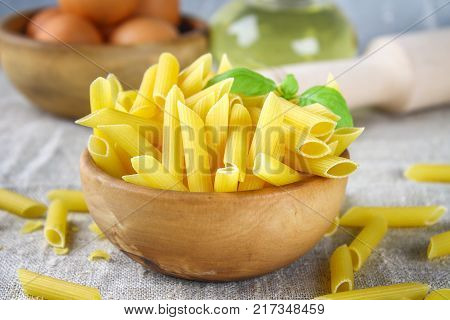Penne rigate. Macaroni in the form of feathers. mostaccioli pasta