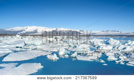 Scenic view of icebergs in Jokulsarlon glacier lagoon Iceland selective focus