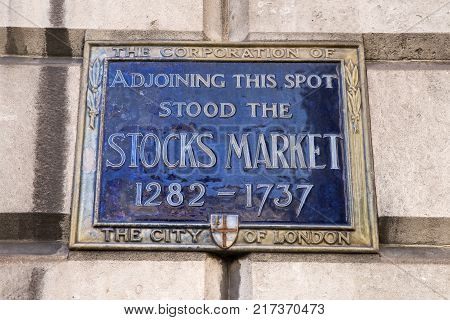 LONDON UK - OCTOBER 6TH 2017: A blue plaque marking the locaton where the Stocks Market once stood on Mansion House in the City of London on 6th October 2017.